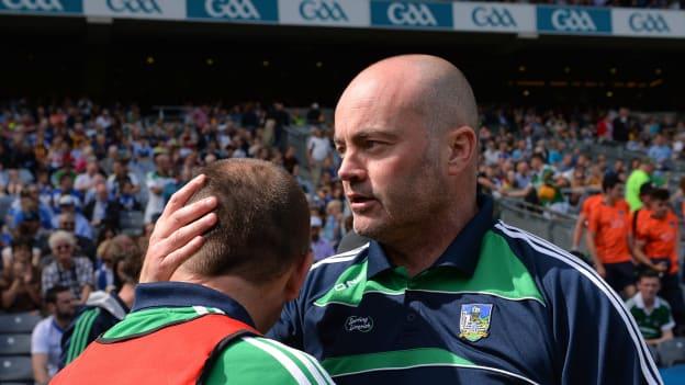 Anthony Daly celebrates with Limerick minor manager Pat Donnelly following their All Ireland Semi Final win over Dublin.