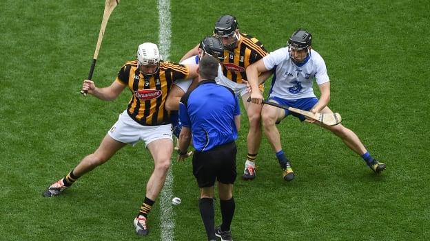 Michael Fennelly, left, and Conor Fogarty of Kilkenny compete for the throw-in against Kevin Moran, and Jamie Barron of Waterford during the 2016 All-Ireland SHC semi-final between Kilkenny and Waterford at Croke Park.