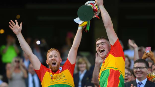 Carlow vice-captains Richard Cody, left, and Diarmuid Byrne lift the Joe McDonagh Cup following victory over Westmeath at Croke Park. 