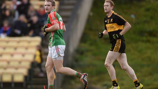 Noel McGrath, Loughmore-Castleiney and Colm Cooper during the game in Killarney.