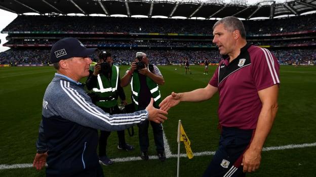 Galway manager Kevin Walsh (r) congratulates Dublin manager Jim Gavin after the All-Ireland SFC semi-final. 