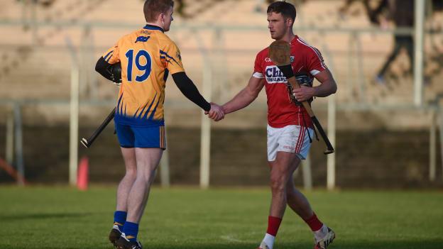 Tony Kelly, Clare, and Eoin Cadogan, Cork, shake hands following the game at Cusack Park, Ennis.