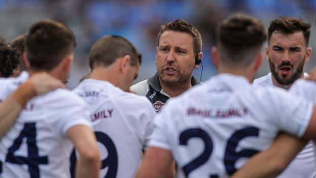 Kildare manager Cian O Neill talks to his players before the Leinster SFC Final.
