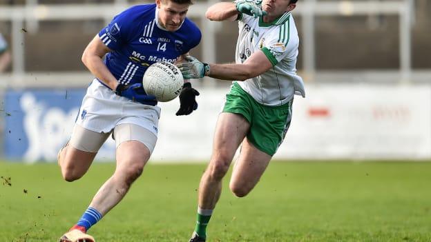 Darren Hughes of Scotstown in action against Declan Rooney of Burren during the AIB Ulster GAA Football Senior Club Championship quarter-final match between Burren and Scotstown at Páirc Esler in Newry, Down.