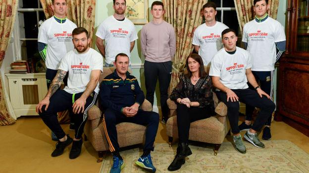 Meath and Dublin will contest the Sean Cox fundraiser challenge match on Sunday. Sean Cox's wife, Martina, and son, Jack, are pictured here with Andy McEntee and footballers from Dublin and Meath ahead of Sunday's game at Pairc Tailteann.