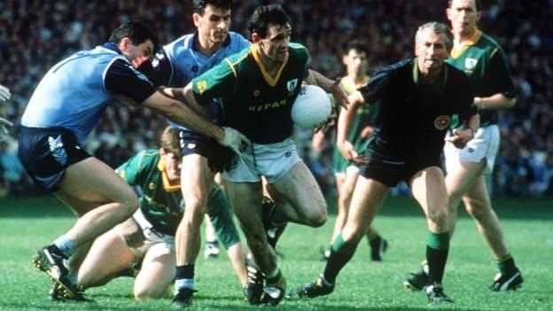 Meath's David Beggy is surrounded by Dublin tacklers. 
