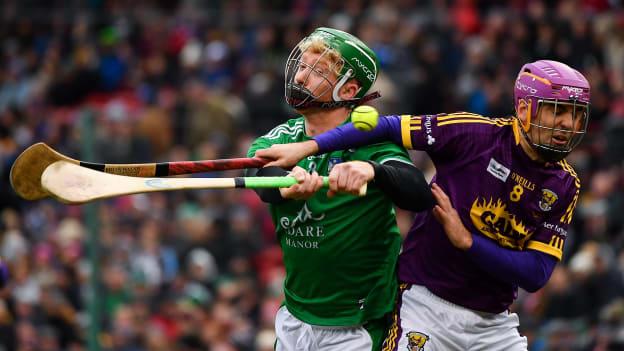Cian Lynch of Limerick in action against Shaun Murphy of Wexford during the Aer Lingus Fenway Hurling Classic 2018 semi-final.