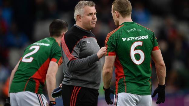 Mayo manager Stephen Rochford talks to Colm Boyle before the game.