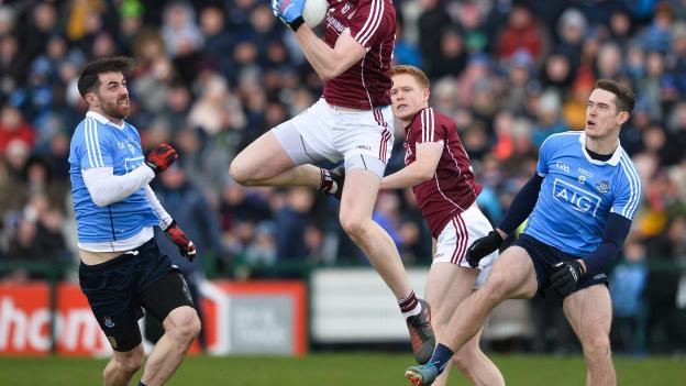Tom Flynn makes a good catch during a lively encounter at Pearse Stadium on Sunday.