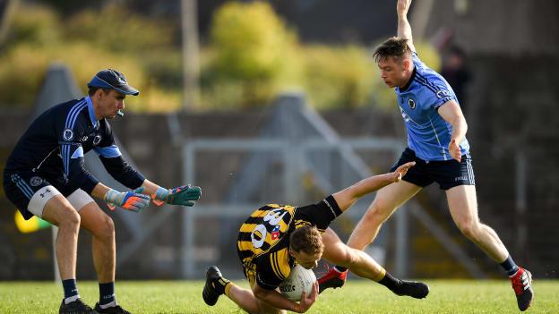 Ronan Jones of St Peter's is fouled by Stephen Moran of Simonstown during the Meath County Senior Club Football Championship Semi-Final match between Simonstown and St Peter's, Dunboyne at Páirc Tailteann in Navan.