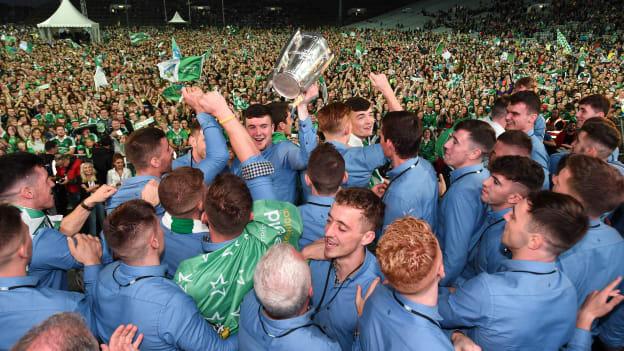 Declan Hannon and the Limerick squad celebrate with the Liam MacCarthy Cup during the Limerick All-Ireland Hurling Winning team homecoming at the Gaelic Grounds in Limerick. 