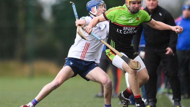 Cha Dwyer, IT Carlow, and Shane Taylor, Mary I, collide in Heywood.