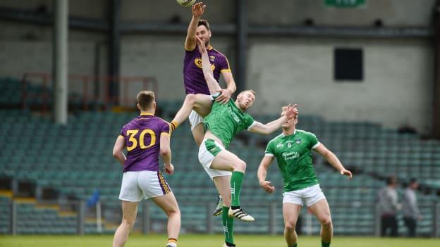 Daithi Waters, Wexford, and David Ward, Limerick, climb high at the Gaelic Grounds.