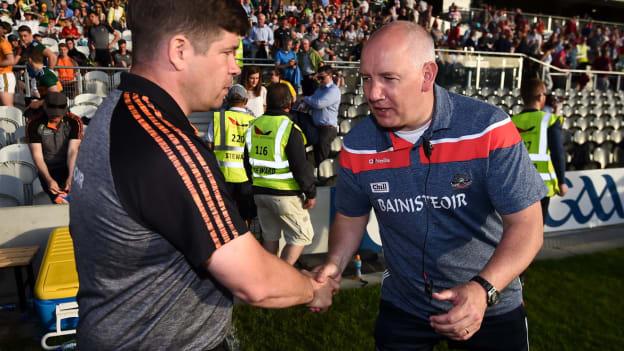 Kerry manager Eamonn Fitzmaurice, left, and Cork manager Ronan McCarthy following the Munster GAA Football Senior Championship Final match between Cork and Kerry at Páirc Ui Chaoimh in Cork. 