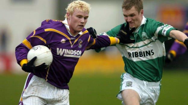 Mark Vaughan, Kilmacud Crokes, and Tommy Fitzgerald, Portlaoise, during the 2004 AIB Leinster Club Semi-Final clash.