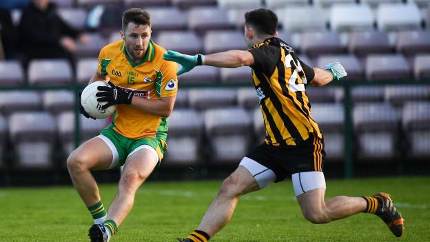 Micheal Lundy fisted a late equaliser for Corofin against Mountbellew-Moylough at Pearse Stadium.