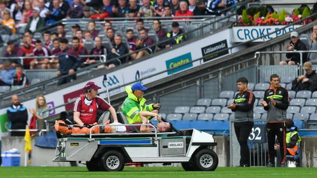 Paul Conroy of Galway is helped off the field on a stretcher after breaking his leg against Kerry in the All-Ireland SFC Quarter-Final. 