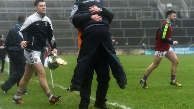 Wexford selector Seoirse Bulfin and manager Davy Fitzgerald celebrating at Pearse Stadium.