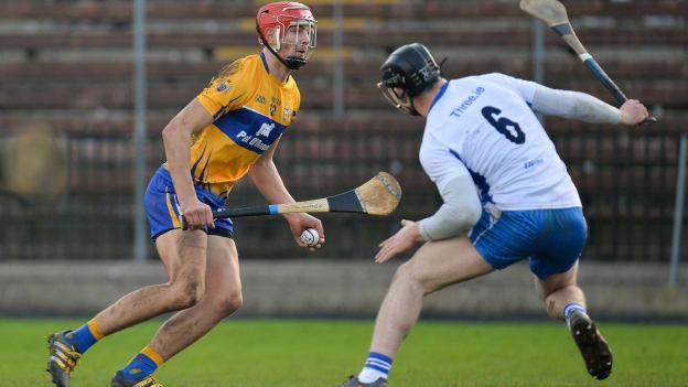 Peter Duggan, Clare, and MJ Sutton, Waterford, in action at Fraher Field.