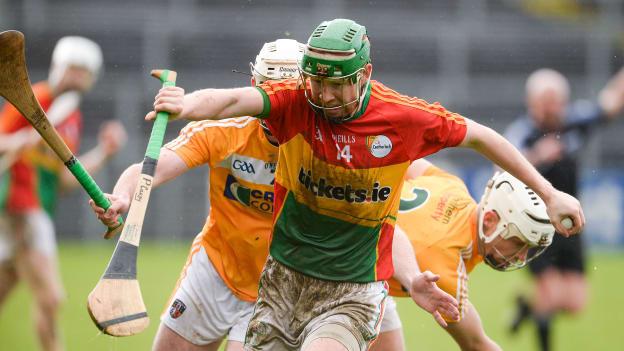 Paul Coady, Carlow, in action against Paddy Burke and Stephen Rooney, Antrim, in the Allianz Hurling League Division 2A Final in April.