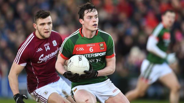 Stephen Coen, Mayo, and Damien Comer, Galway, in Allianz Football League action last Sunday.