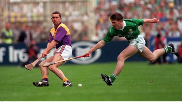 Wexford's Larry O'Gorman in action against Limerick's Mark Foley in the 1996 All-Ireland SHC Final. 