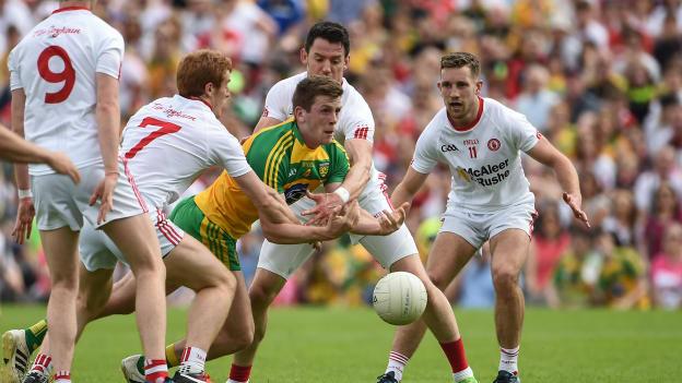 Eoghan Ban Gallagher, Donegal, surrouned by four Tyrone players in Clones.