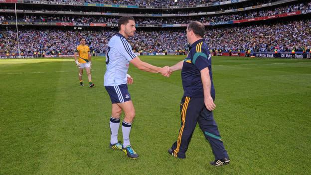 Seamus McEnaney shakes hands with Bernard Brogan following the 2012 Leinster SFC Final.