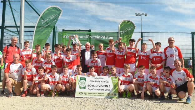 O'Donovan Rossa GAC players with the 2018 John West Féile Peil na nÓg Boys Division 1 Cup after their victory over Burren GAC.