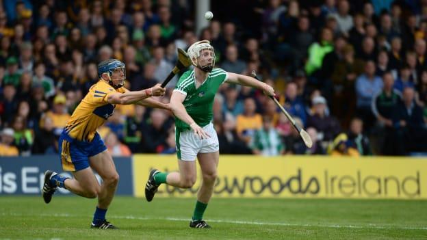 Cian Lynch, Limerick, and David McInerney, Clare, during the 2017 Munster Senior Hurling Championship.