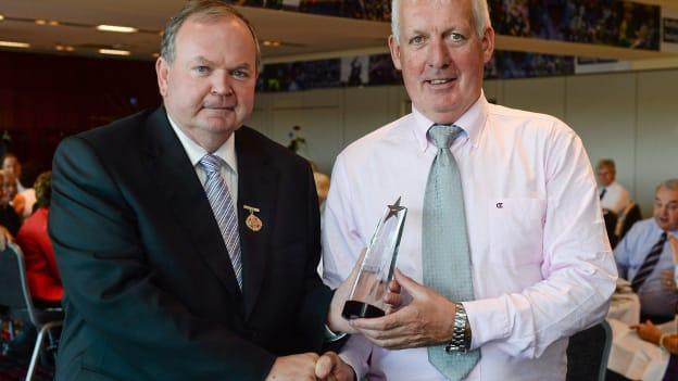Former Uachtarán Chumann Lúthchleas Gael Liam Ó Néill presents legendary Roscommon footballer, Tony McManus, with his 'Stars of the 80's' award before the 2013 All-Ireland SFC Final. 