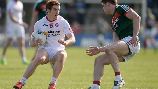 Peter Harte, Tyrone, and Lee Keegan, Mayo, in action during the 2017 Allianz Football League.