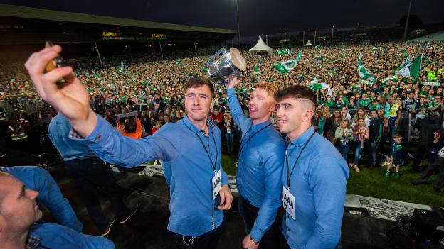 Diarmaid Byrnes, Cian Lynch and Aaron Gillane, from Patrickswell GAA club, with the Liam MacCarthy cup during the Limerick All-Ireland Hurling Winning team homecoming at the Gaelic Grounds in Limerick. 