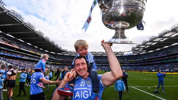 Denis Bastick and his son Aidan celebrate with the Sam Maguire Cup after Dublin's 2017 All-Ireland SFC Final victory over Mayo. 