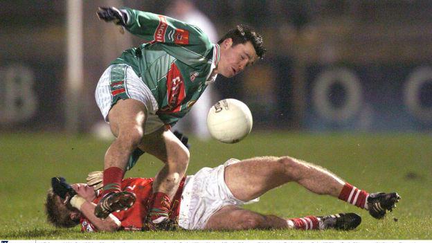 Sean Malee and Anthony Lynch collide during a 2004 Allianz Football League game between Mayo and Cork at Pairc Ui Rinn.