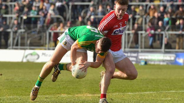 Donal Lenihan, Meath, and Kevin Flahive, Cork, in action at Pairc Tailteann.