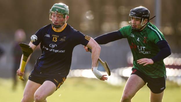 Fergal Whitely, DCU, and Eoin Quilty, LIT, in Electric Ireland Fitzgibbon Cup action.