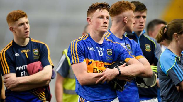 Jerome Cahill of Tipperary with his team-mates after defeat to Cork in the Bord Gáis Energy Munster U-21 Hurling Final.  