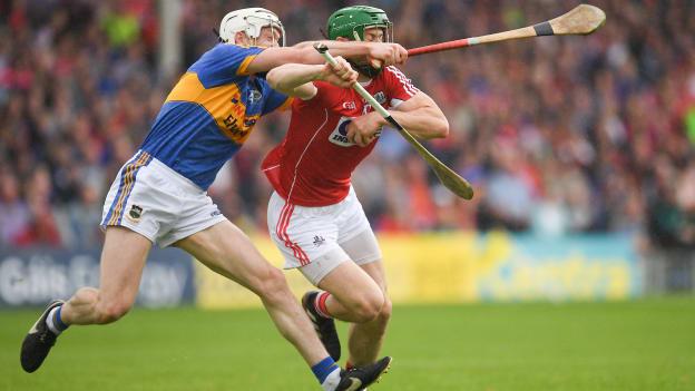 Seamus Harnedy, Cork, and Michael Cahill, Tipperary, collide at Semple Stadium.