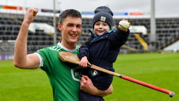 Kilmallock's Gavin O'Mahony celebrates with his son Quin, aged 2, following an impressive AIB Munster Club SHC win over Midleton.