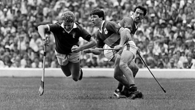 Jim Cashman, Cork, is tackled by Tipperary's Pat Fox and team-mate Donie O'Connell, right, in the 1987 Munster SHC Final replay. 