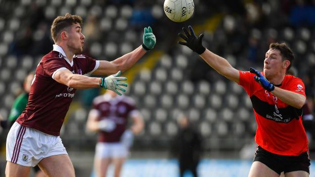 Michael Daly, NUIG, and Michael Flood, UCC, in Electric Ireland Sigerson Cup action at Mallow.
