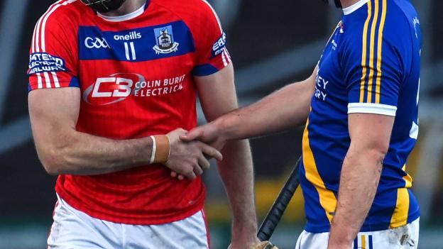 Conor Cooney, St Thomas', and Caimin Killeen, Loughrea, shake hands following the drawn Brooks Galway SHC Final.
