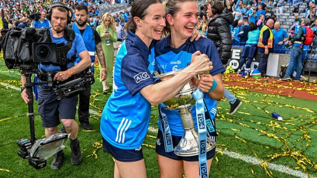 Dublin players Sinéad Aherne, left, and Martha Byrne celebrates with the Brendan Martin Cup after the 2023 TG4 LGFA All-Ireland Senior Championship Final match between Dublin and Kerry at Croke Park in Dublin. Photo by Seb Daly/Sportsfile