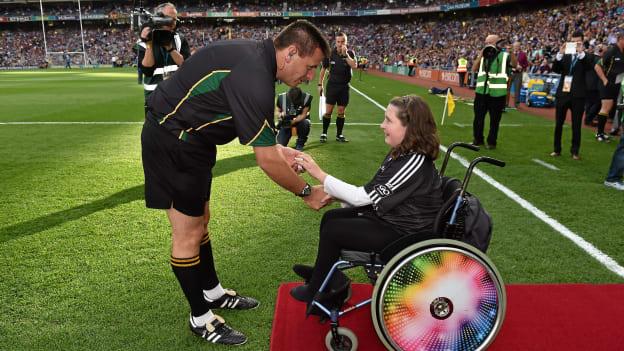 Ellie Sheehy, Templeglantine, Co. Limerick, presents the match sliotar to referee Brian Gavin before the 2014 All-Ireland SHC Final replay between Kilkenny and Tipperary.