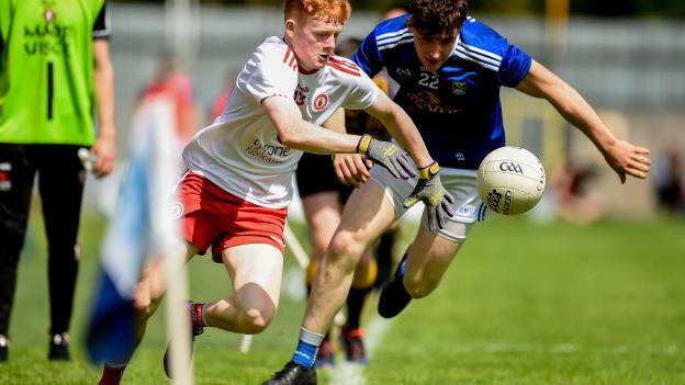 James Garrity of Tyrone in action against Michael Muldoon of Cavan during the EirGrid Ulster GAA Football U20 Championship semi-final match between Cavan and Tyrone at St. Tiernach's Park in Clones, Monaghan. 