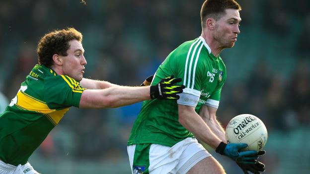 Seamus O Carroll, Limerick, and Tadhg Morley, Kerry, during the McGrath Cup Final at the Gaelic Grounds.