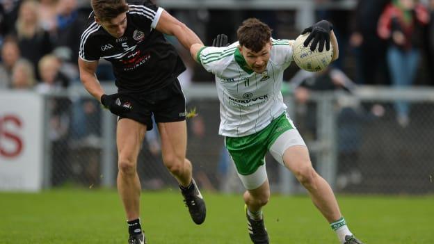 Donal O'Hare, Burren, and Aaron Branagan, Kilcoo, during the 2017 Down SFC Final.