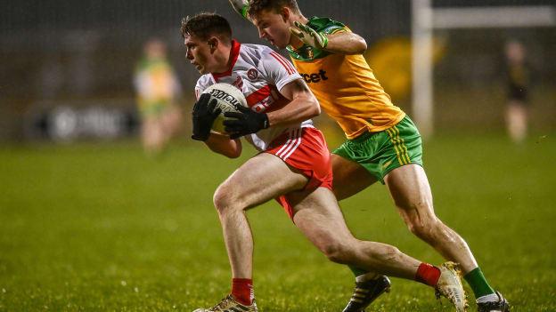 Michael McEvoy, Derry, and Tony McClenaghan, Donegal, in Dr McKenna Cup action at Páirc MacCumhaill.