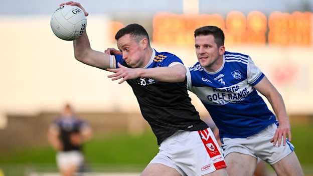 Shane Ryan, East Kerry, and Shane Brosnan, Kerins O'Rahillys, in Kerry SFC action.